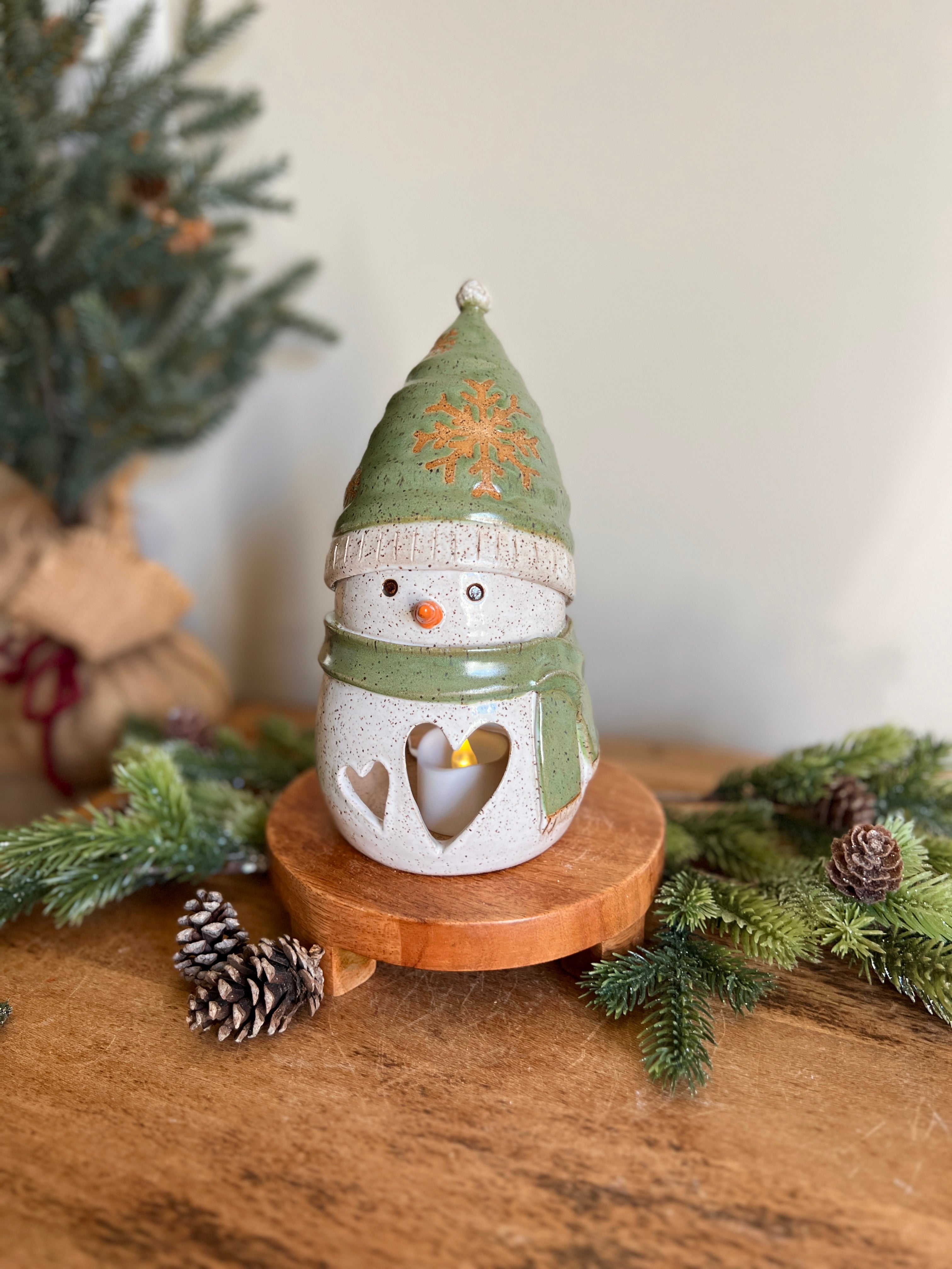 green snowflake snowman luminary